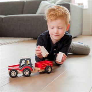 Tractor met aanhanger - hooibalen